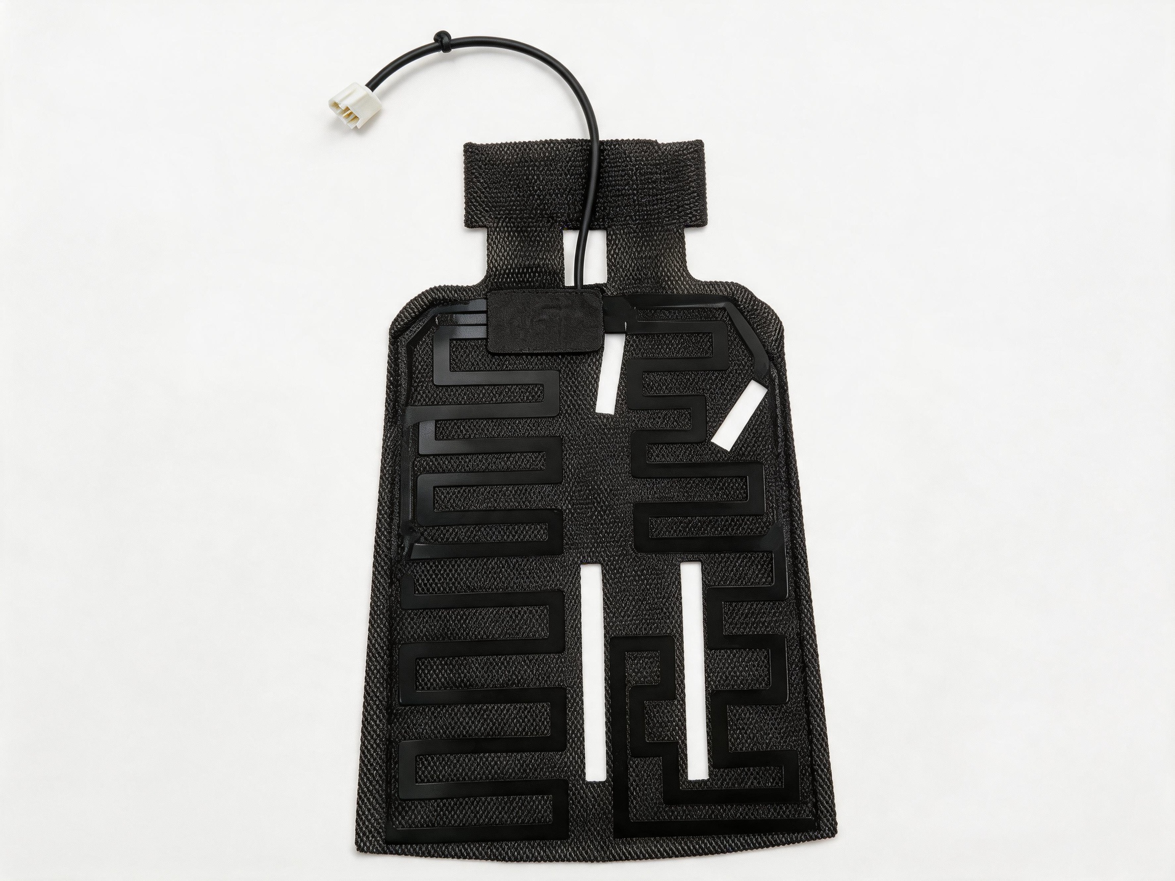 Real flexible heating film product with the complete heater pattern, cable and connector visible on a white background